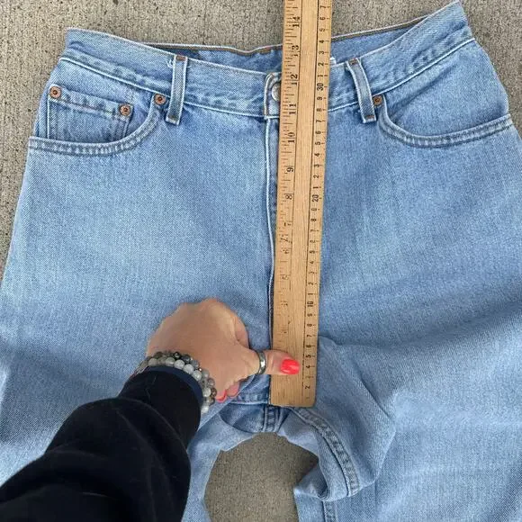 Vintage 90s Levi's 550 Relaxed Fit Tapered Leg Light Blue Jeans Size 12 Reg M
